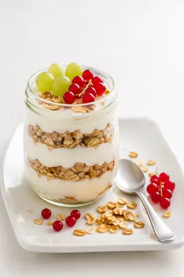 Layered Granola Yogurt Parfait in Glass Jar