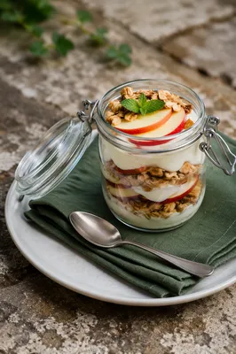Layered Granola Yogurt Parfait in Glass Jar