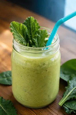 Fresh Green Smoothie with Kale Garnish
