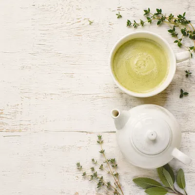 Overhead Matcha Latte on White Tabletop