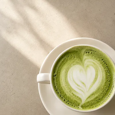 Overhead Matcha Latte with Heart Foam