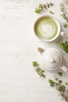Overhead Matcha Latte with White Teapot
