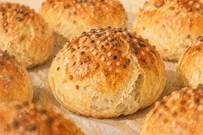 Golden Sourdough Rolls With Toasted Seeds