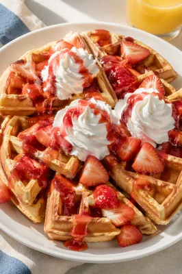 Belgian Waffles with Cream and Strawberries