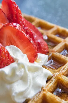 Belgian Waffle with Cream and Strawberries