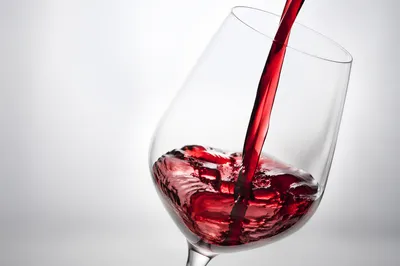 Elegant Red Wine Pour in Glass