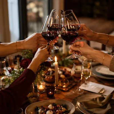 Elegant Wine Glass Cheers at Dinner