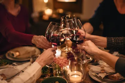 Crystal Wine Glasses Toast at Dinner