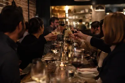 Warm Bistro Dinner Toast Celebration