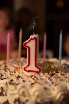 Blown Out Birthday Candle on Vanilla Cake