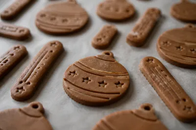 Festive Gingerbread Cookies on Parchment