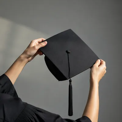 Graduation Cap Lifted in Quiet Celebration