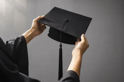 Graduation Cap Lifted in Quiet Celebration