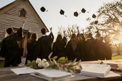 Chapel Graduation Caps in Golden Light