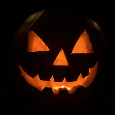 Glowing Carved Halloween Pumpkin Lantern