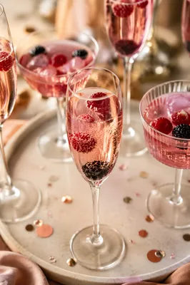 Elegant Holiday Champagne Toast with Confetti
