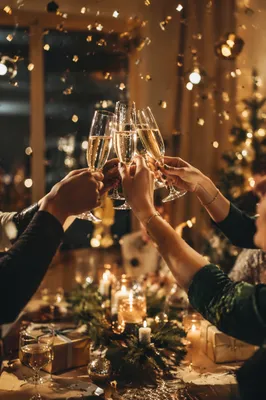 Elegant Champagne Toast with Holiday Confetti