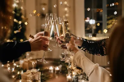 Holiday Champagne Toast with Falling Confetti