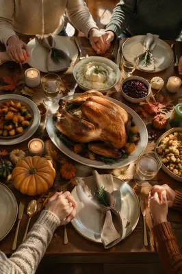 Thanksgiving Family Prayer Around Turkey Dinner