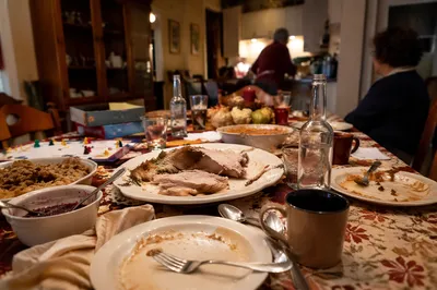 Cozy Thanksgiving Dinner Table After Feast