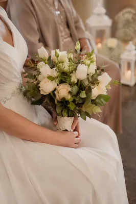 Bride Holding White Wedding Bouquet Close-Up