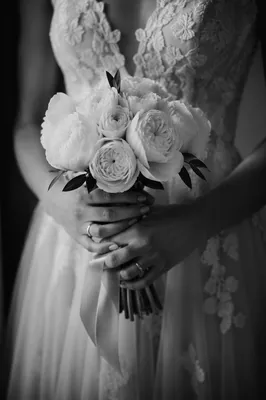 Bride Holding White Rose Wedding Bouquet
