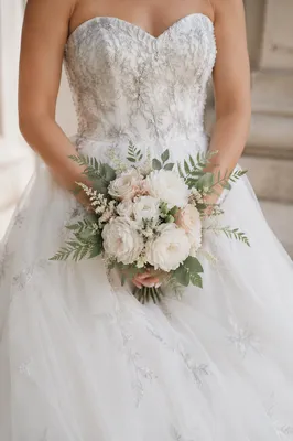 Elegant Bride Holding White Wedding Bouquet