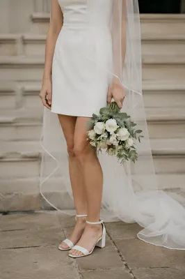 Romantic Bride with White Flower Bouquet