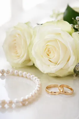 White Rose Bridal Bouquet With Wedding Rings