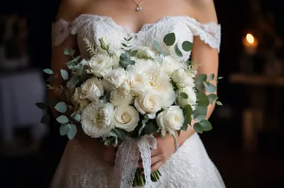 Elegant White Bridal Bouquet With Lace Gown