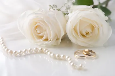 White Rose Bridal Bouquet With Wedding Rings