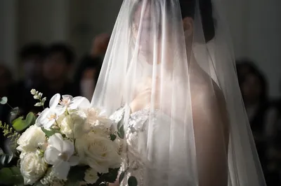Bride Holding White Floral Wedding Bouquet
