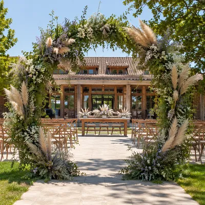 Outdoor Wedding Ceremony Floral Arch in Garden