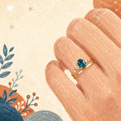 Elegant Gold Wedding Rings with Teal Gemstone