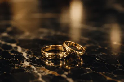 Elegant Gold Wedding Rings on Marble