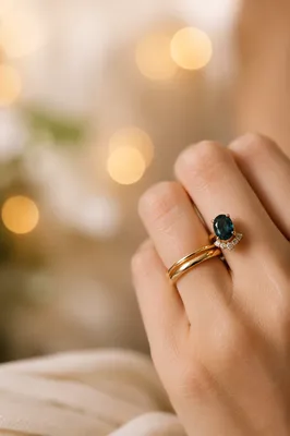 Elegant Gold Wedding Rings with Teal Gemstone
