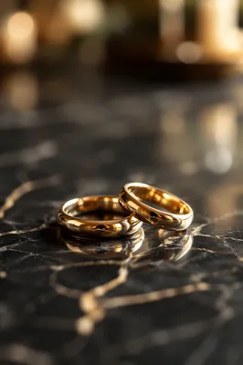 Elegant Gold Wedding Rings on Marble