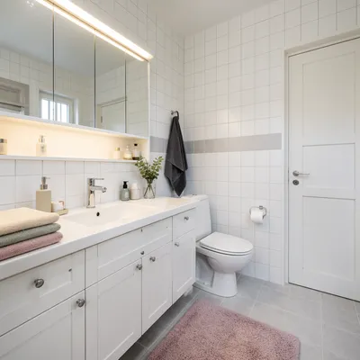 Clean Modern White Tile Bathroom Interior