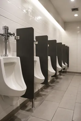 Spotless Modern Public Bathroom With White Tiles