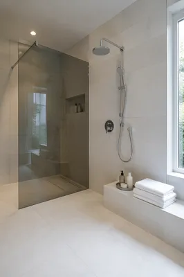 Modern White Tiled Bathroom With Glass Shower