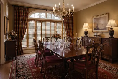 Elegant Traditional Dining Room With Burgundy Chairs