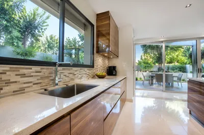 Bright Modern Kitchen With Garden Patio View