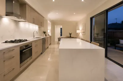 Bright Modern Kitchen with White Countertop Island