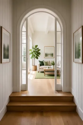 White Arched Doorway to Bright Minimalist Room