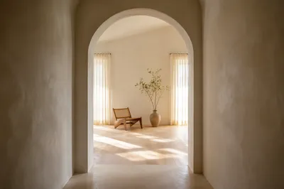 Minimalist Arch Doorway to Sunlit Room