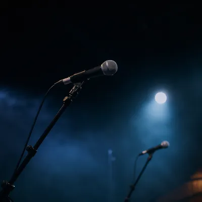Microphones on Blue Lit Church Stage
