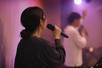 Praise Team Microphone Under Stage Lights