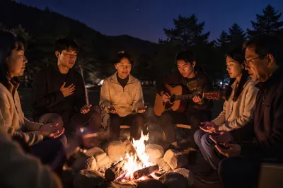 Korean Worship Group Around Campfire