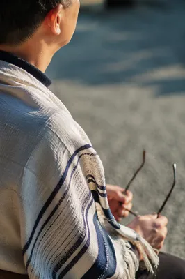 Prayer Shawl Reflection in Korean Church Courtyard
