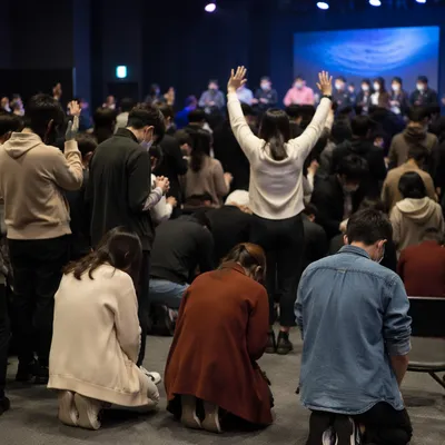 Fervent Prayer at Korean Revival Meeting